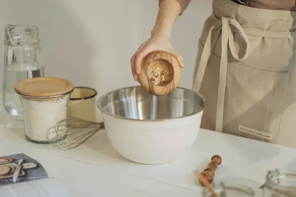 Dog owner preparing a meal