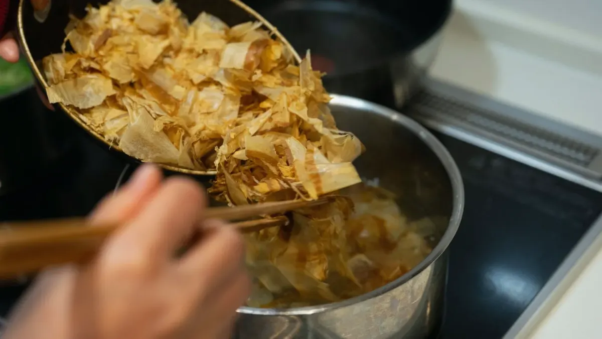 Dog owner preparing a meal