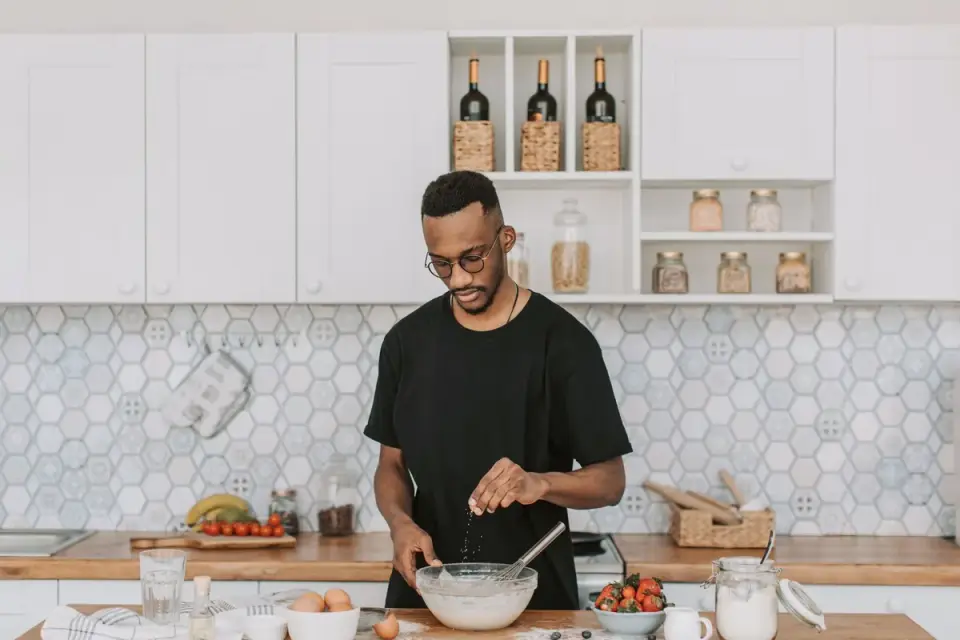Dog owner preparing a meal